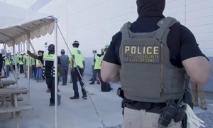 South Korea requests uncuffed release of detained workers from US detention
