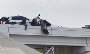 Police cruiser hit, officers trapped on overpass