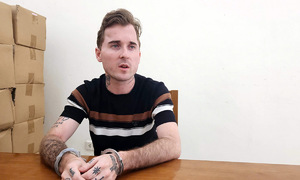 Foreign national threatens bar patron with handgun