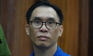 Tycoon Dinh Truong Chinh on trial for prime real estate acquisition in Saigon