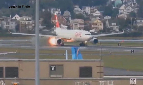 Passenger plane emits flames before takeoff