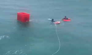 Four fishermen rescued after clinging to Styrofoam box at sea