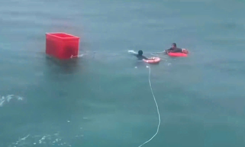 Four fishermen rescued after clinging to Styrofoam box at sea