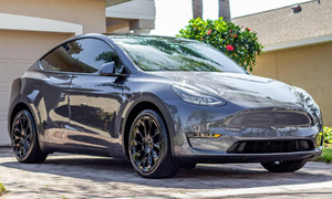Parents forced to smash Tesla windows to rescue trapped children
