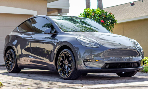 Parents forced to smash Tesla windows to rescue trapped children
