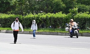 Pedestrians fined for jaywalking in Ho Chi Minh City