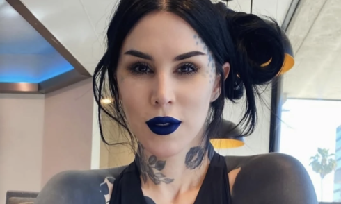 Kat Von D covers 80% of her body in black ink to obscure tattoos
