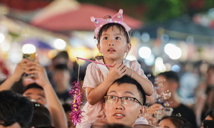 Hang Ma street bustles with early Mid-Autumn Festival crowds