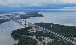 Central Vietnam's longest lagoon-crossing bridge nears completion