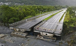 Taiwan dam bursts, sweeping away bridge