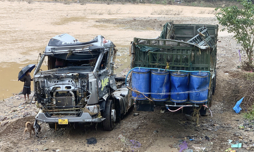 Tractor-trailer swept away by flood recovered in Quang Tri