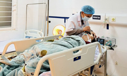 Two people in critical condition after burning charcoal for warmth in a closed room