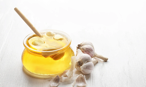 Is consuming garlic steeped in honey in the morning beneficial?