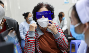 Ho Chi Minh City reviews residents over 65 for free health insurance cards