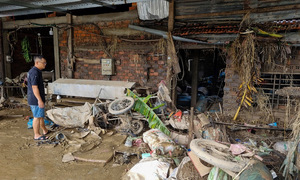 Cleaning up homes, workshops, and schools after the flood