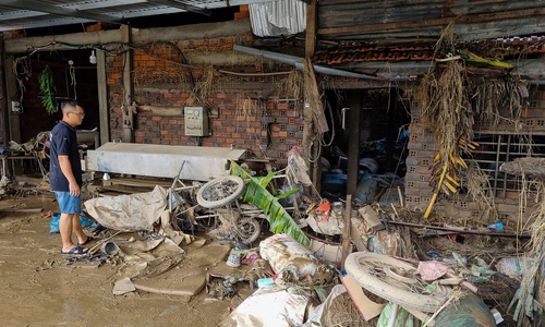 Cleaning up homes, workshops, and schools after the flood