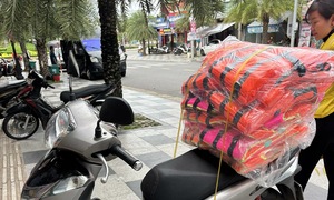 Spending millions of dong on survival gear to prepare for storms and floods