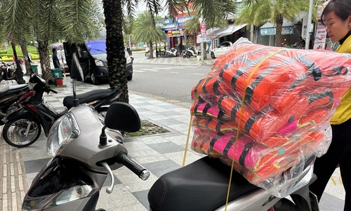 Spending millions of dong on survival gear to prepare for storms and floods