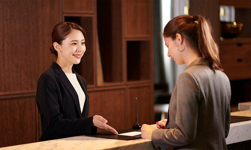 Why hotel receptionists do not announce guest room numbers