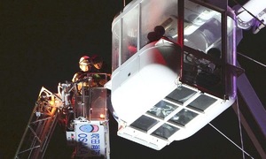 Passengers stranded for 9 hours in air after lightning strike hits ferris wheel