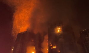 19-hour blaze engulfs Hong Kong apartment complex
