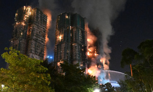 44 dead in Hong Kong apartment complex fire