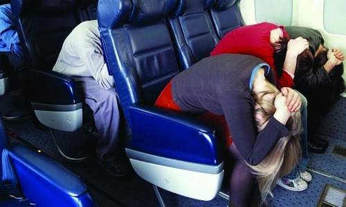 The brace position to minimize passenger injury during an airplane incident