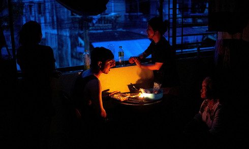 Thai family clings to belongings for 48 hours amidst floodwaters