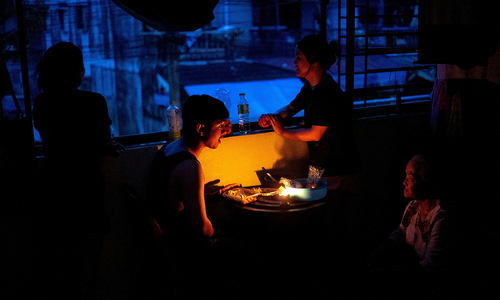 Thai family clings to belongings for 48 hours amidst floodwaters