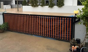 Using a tarp to protect an entire house from floodwaters