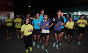 Runners and pacers complete warm-up run ahead of VnExpress Marathon Hanoi Midnight Powered by Puma