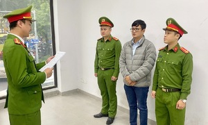 Head of management board charged in apartment parking dispute