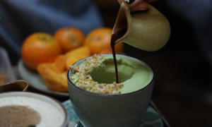 Customers queue for hours for coffee-mixed ice cream in Hanoi