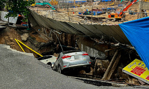 Leaky high-rise wall, heavy rain cause sinkhole in Da Nang city center