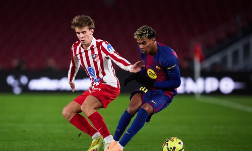 Barcelona snaps Atletico's unbeaten streak in La Liga