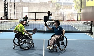 Playing pickleball in a wheelchair
