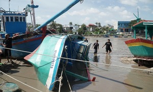 Dozens of boats submerged by floodwaters salvaged in Lam Dong
