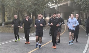 French president jogs in China park