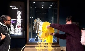 Group arrested for throwing food at British crown jewels display