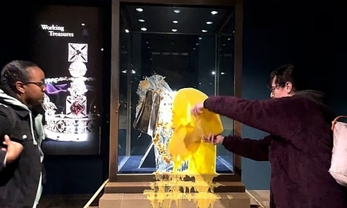 Group arrested for throwing food at British crown jewels display