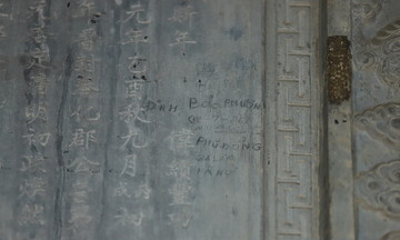 Stele at Nguyen Dynasty royal tomb defaced with illegal carvings
