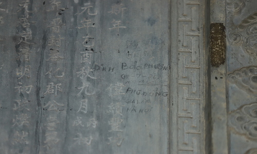 Stele at Nguyen Dynasty royal tomb defaced with illegal carvings