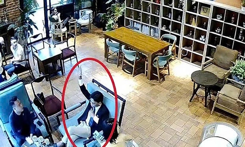 'Tycoon' arrested for ordering assault at coffee shop