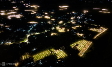 27,000 lights illuminate flower fields to 'force' Tet blooms