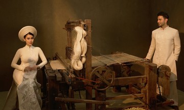 Tien Nguyen and Dubai husband pose with over century-old loom