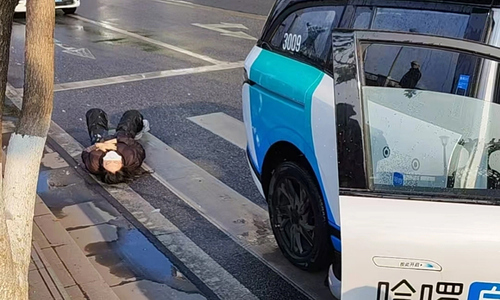 Self-driving taxi strikes two pedestrians, sending them to hospital