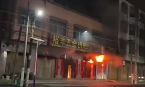 Fire in 4-story China home kills 12 family members