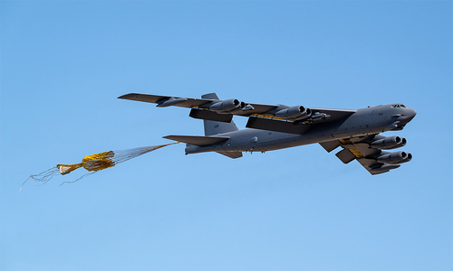 US B-52 bomber deploys drogue chute mid-air