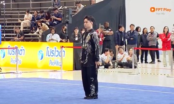 Nguyen Trong Lam performs tai chi sword