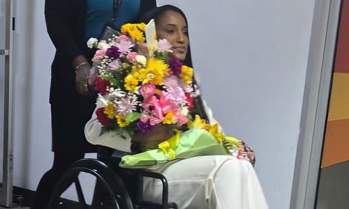 Miss Jamaica returns home in wheelchair